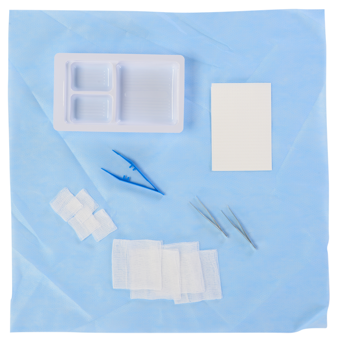 Contents of a Pristine Medical dressing tray, including gauze, forceps, and sterile items for training