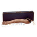A realistic arm model lies near a carrying case, accompanied by syringes and other medical supplies. It is likely used for medical training.