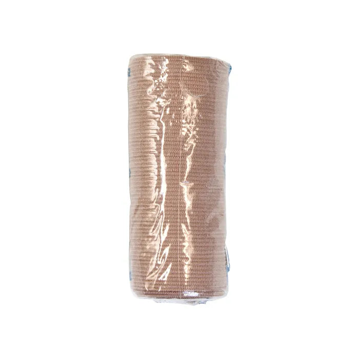 A tan elastic bandage is rolled and packaged in transparent plastic against a white background.