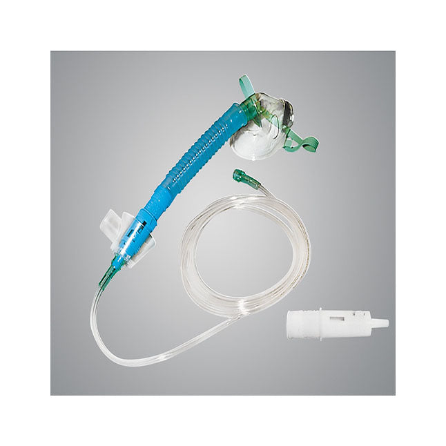 An oxygen mask with a blue corrugated hose and clear tubing lies on a gray surface. A white plastic connector is located near the end of the tubing.
