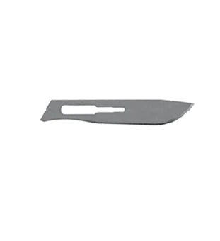 A scalpel blade rests on a plain white background. It is metallic, silver-gray in color, and shows a sharp point and a central handle slot.