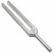 A metal tuning fork sits upright against a plain white background. It appears to be unused.