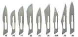 Scalpel blades of varying sizes and shapes are displayed. Numbers 18, 20, 21, 22, 23, 25, 25A, 26, and 36 are visible beneath each blade.